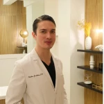 Ken Cirka in medical dermatology consultation for uneven skin tone treatment at Natural Beauty Fifth Avenue